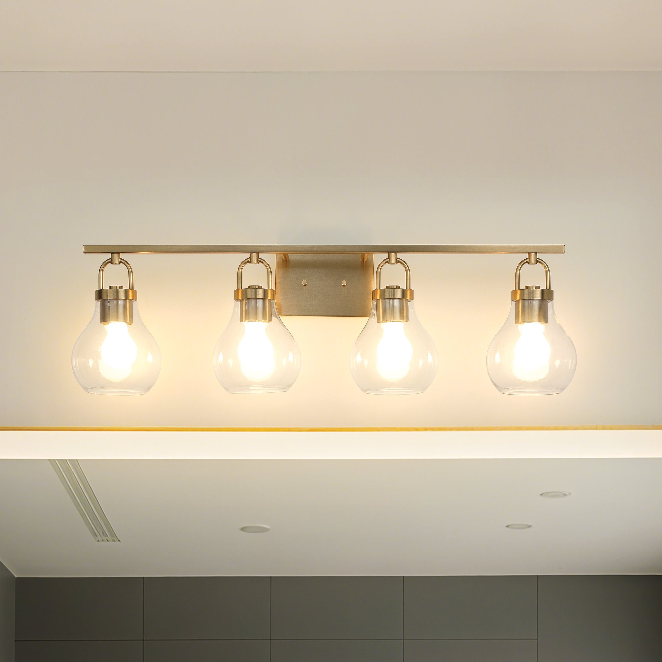 Mansfield 34-inch 4-light Champagne Gold Vanity Light with Clear Glass Shades