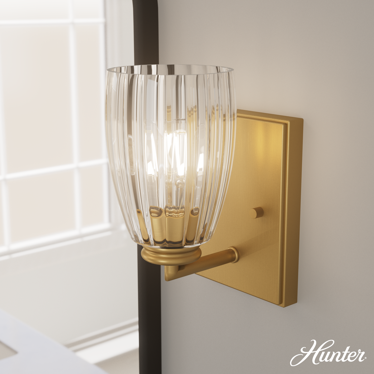Rossmoor 9-inch 1-light Luxe Gold Wall Sconce with Clear Fluted Glass