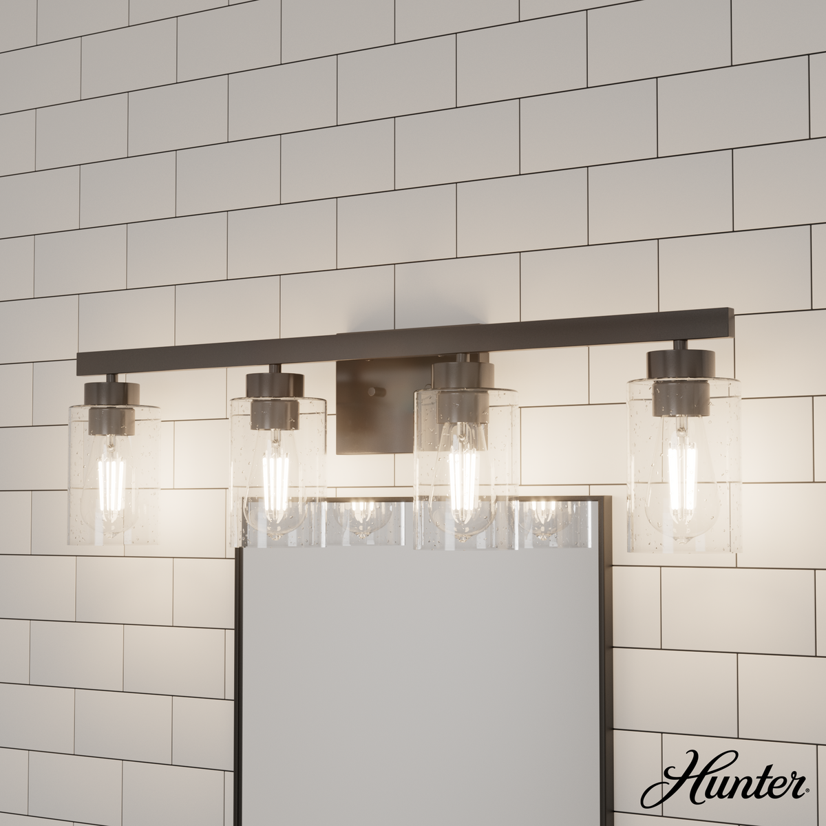 Hartland 31-inch 4-light Noble Bronze Vanity Light with Seeded Glass