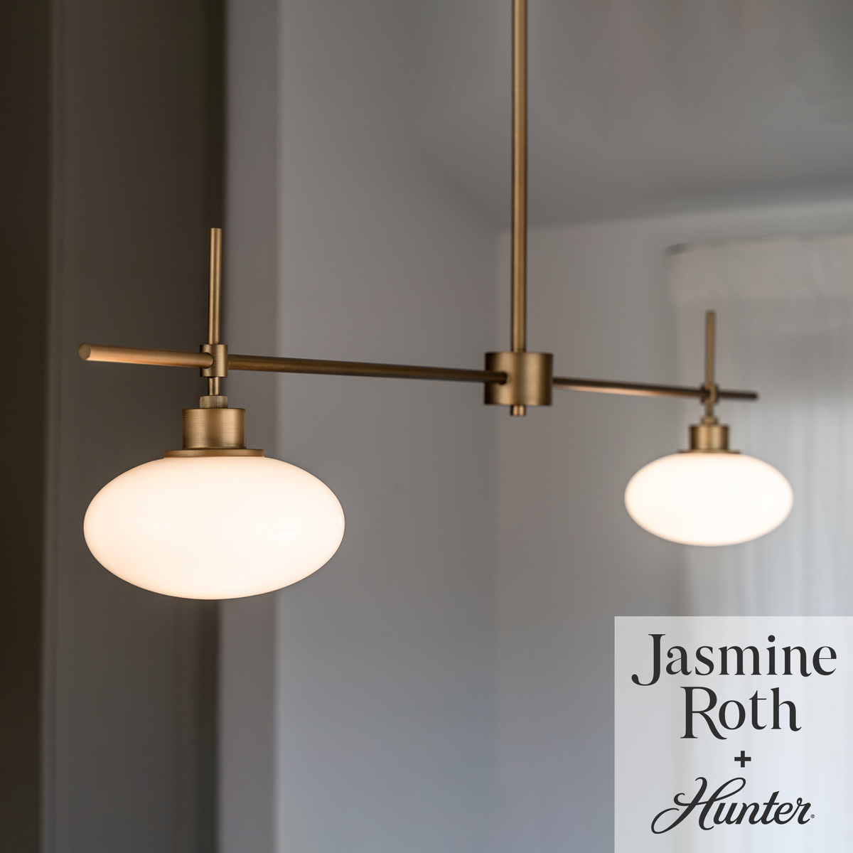 Getty 52-inch 2-light Luxe Gold Linear Chandelier with Cased White Glass