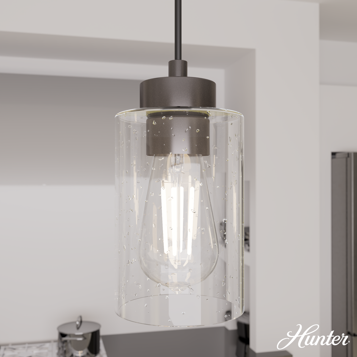 Hartland 26.75-inch 3-light Noble Bronze Linear Pendant Cluster with Seeded Glass