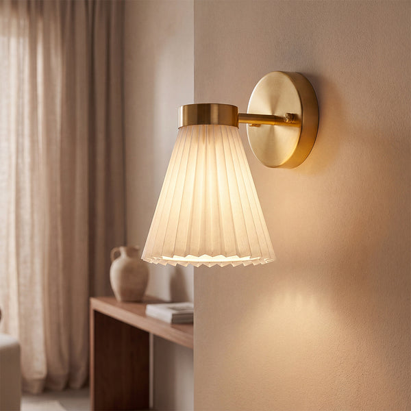 Amore 1 Light Aged Brass Linen Wall Sconce with white pleated shade