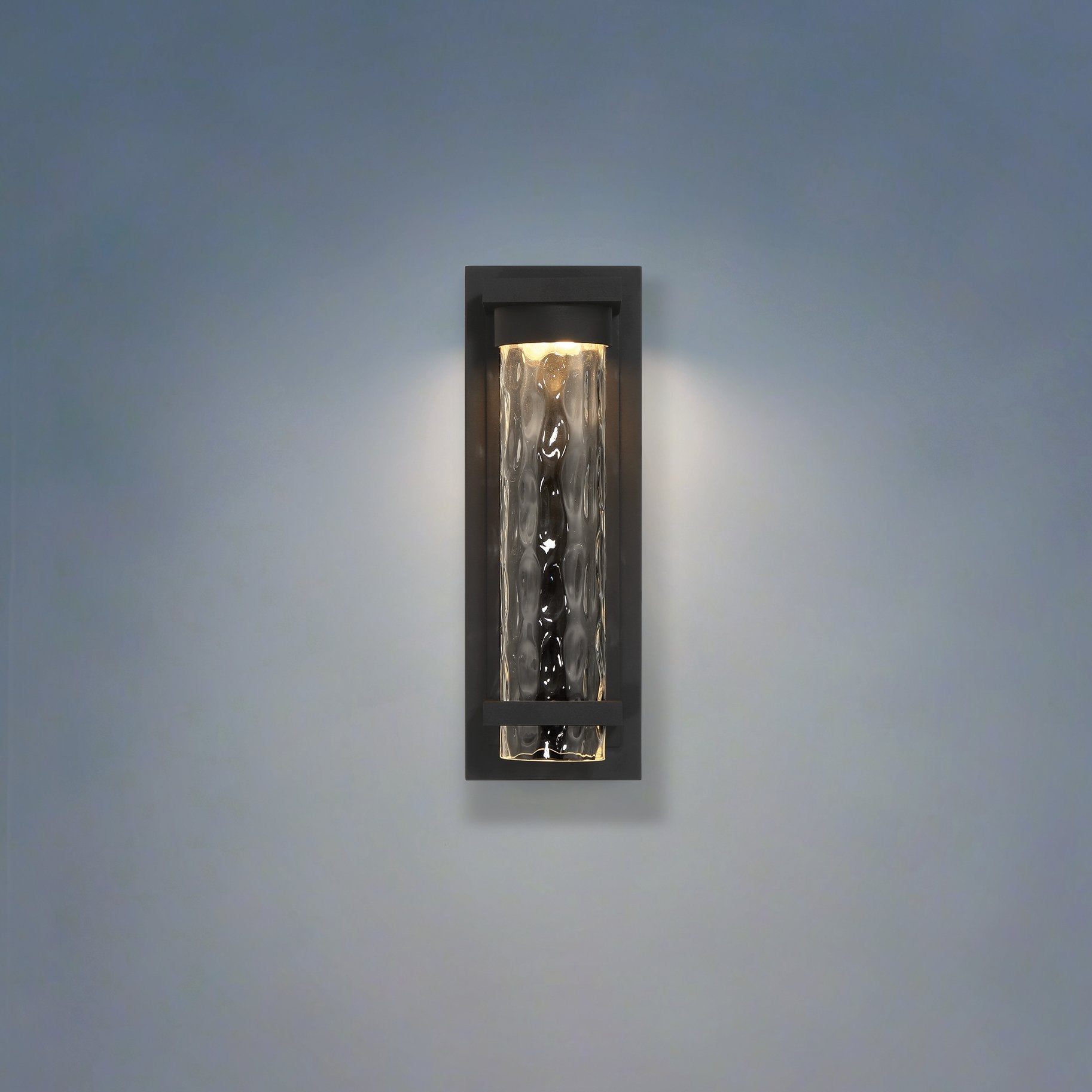 Lionel 14-inch Textured Black LED Exterior Wall Sconce with Clear Water Glass Shade