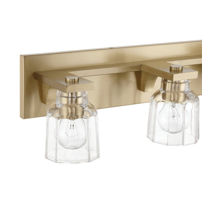 Dryden 32-inch 4-light Champagne Gold Vanity Light with Clear Ribbed Glass Shades