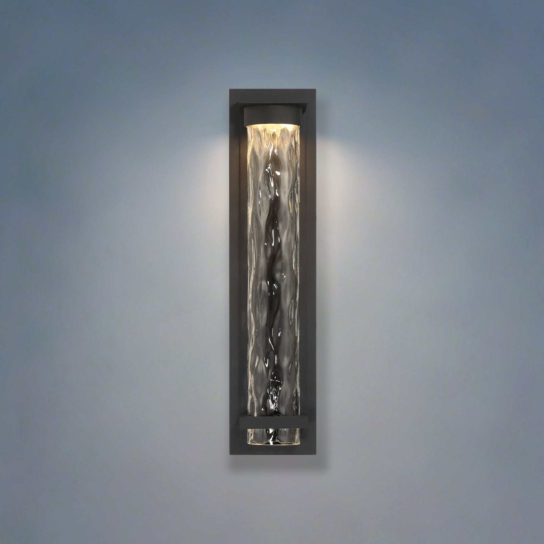 Lionel 20-inch Textured Black LED Exterior Wall Sconce with Clear Water Glass Shade