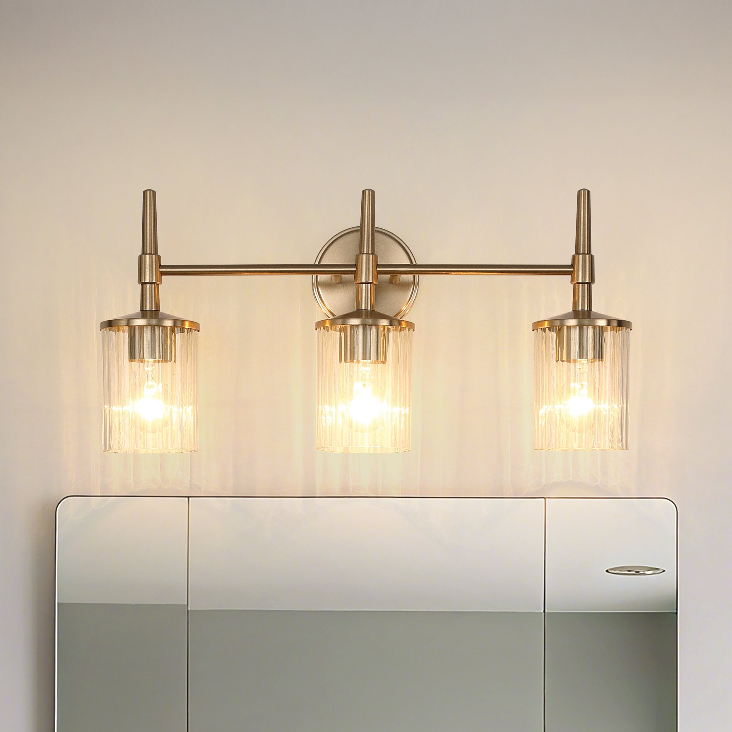Andrea 24-inch 3-light Champagne Gold Vanity Light with Clear Ribbed Glass Shades