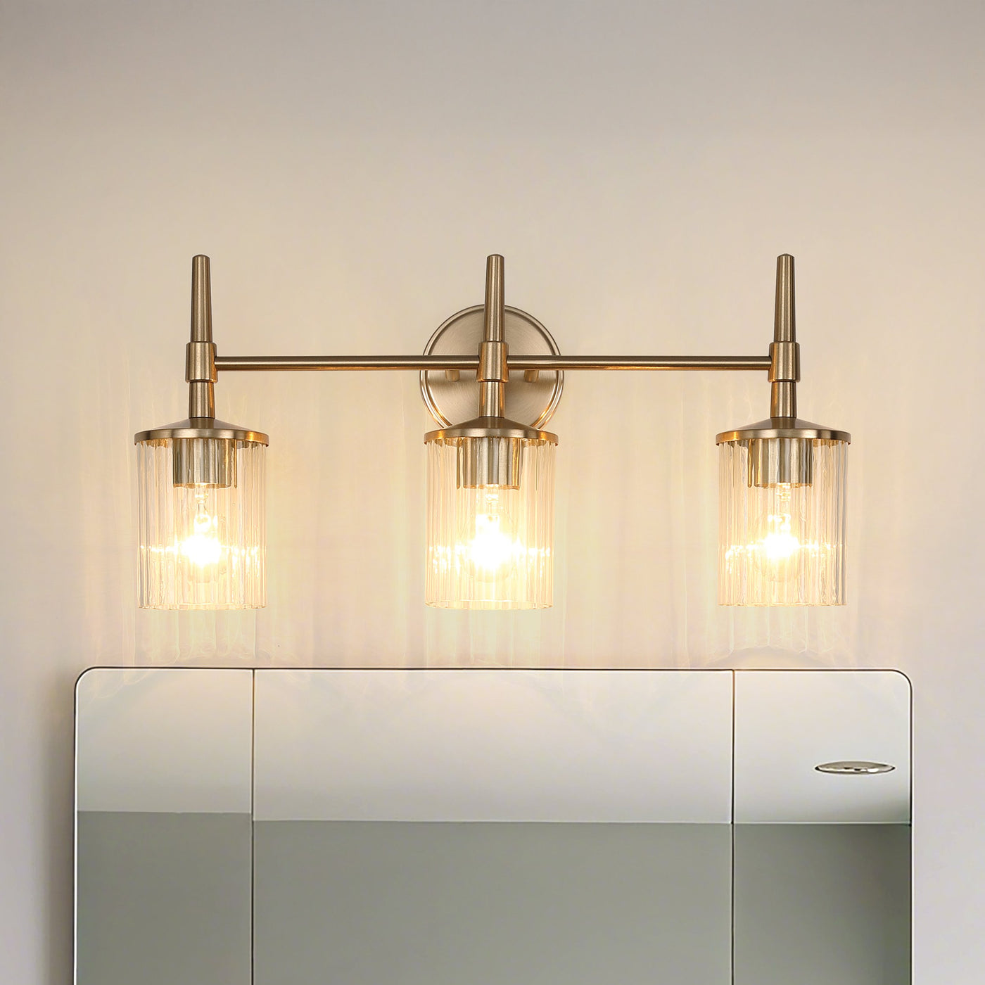 Andrea 24-inch 3-light Champagne Gold Vanity Light with Clear Ribbed Glass Shades