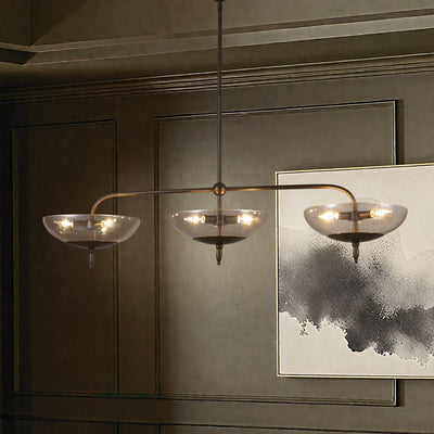 Fiorello 54-inch 9-light Forged Bronze Linear Chandelier with Smoked Amber Glass Shades