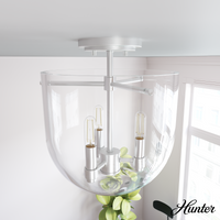 Hartland 22-inch 3-light Alturas Gold Vanity Light with Seeded Glass