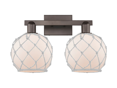 Arcadia Bath Vanity Light Brass Wicker