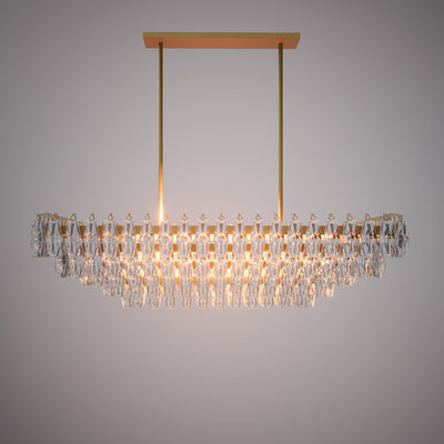 Prism 54-inch 19-light Aged Brass Dimmable Linear Chandelier with Clear Glass