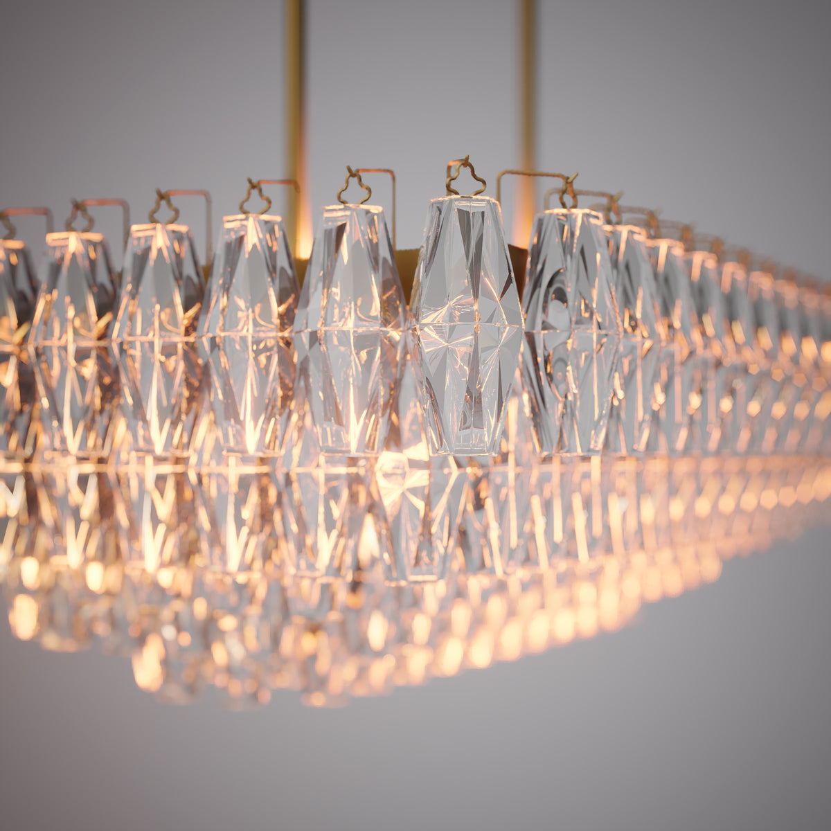 Prism 54-inch 19-light Aged Brass Dimmable Linear Chandelier with Clear Glass