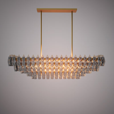 Prism 54-inch 19-light Aged Brass Dimmable Linear Chandelier with Smoke Glass