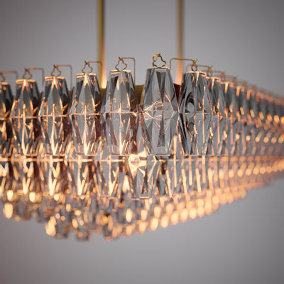 Prism 54-inch 19-light Aged Brass Dimmable Linear Chandelier with Smoke Glass