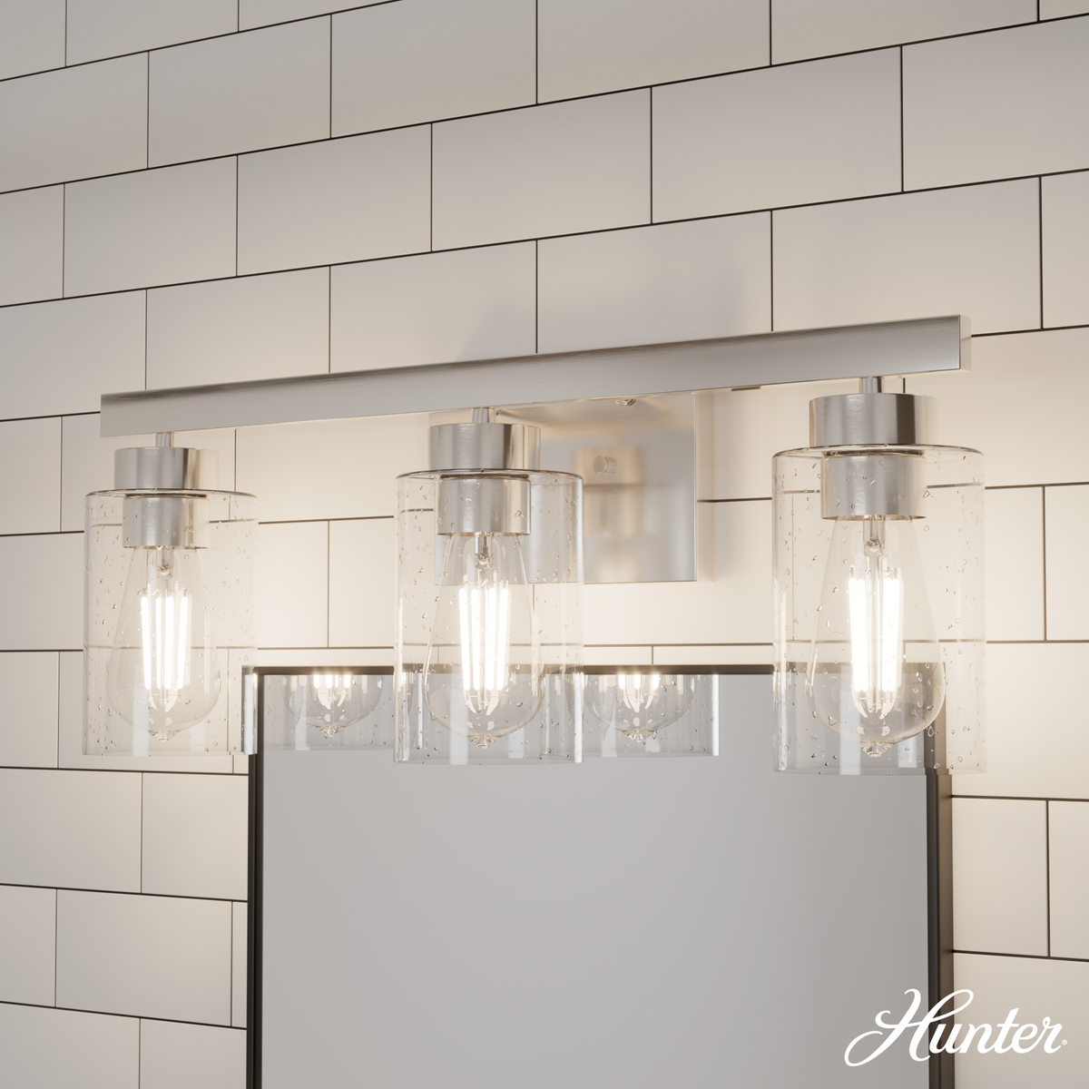 Hartland 22-inch 3-light Brushed Nickel Vanity Light with Seeded Glass