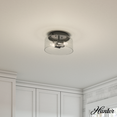 Hartland 11.5-inch 2-light Noble Bronze Flush Mount Ceiling Light with Seeded Glass