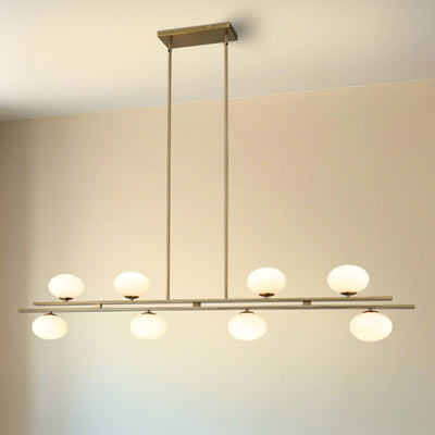 Julep 64-inch 8-light Brushed Gold Linear Chandelier with Opal Glass Shades