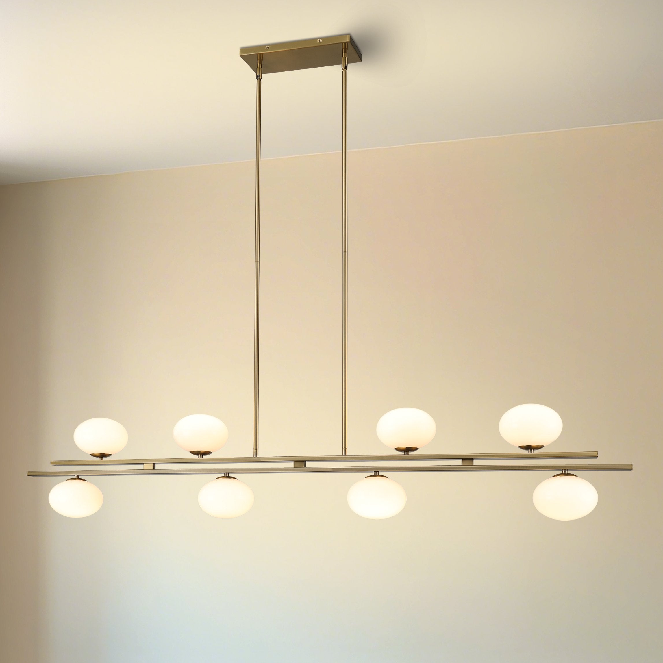 Julep 64-inch 8-light Brushed Gold Linear Chandelier with Opal Glass Shades