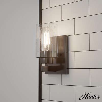 Hartland 9-inch 1-light Noble Bronze Wall Sconce with Seeded Glass