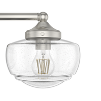 Saddle Creek 23.5-inch 3-light Brushed Nickel Vanity Light with Clear Seeded Glass