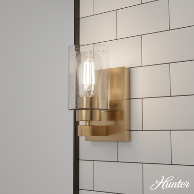 Hartland 9-inch 1-light Alturas Gold Wall Sconce with Seeded Glass