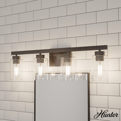 Hartland 31-inch 4-light Noble Bronze Vanity Light with Seeded Glass